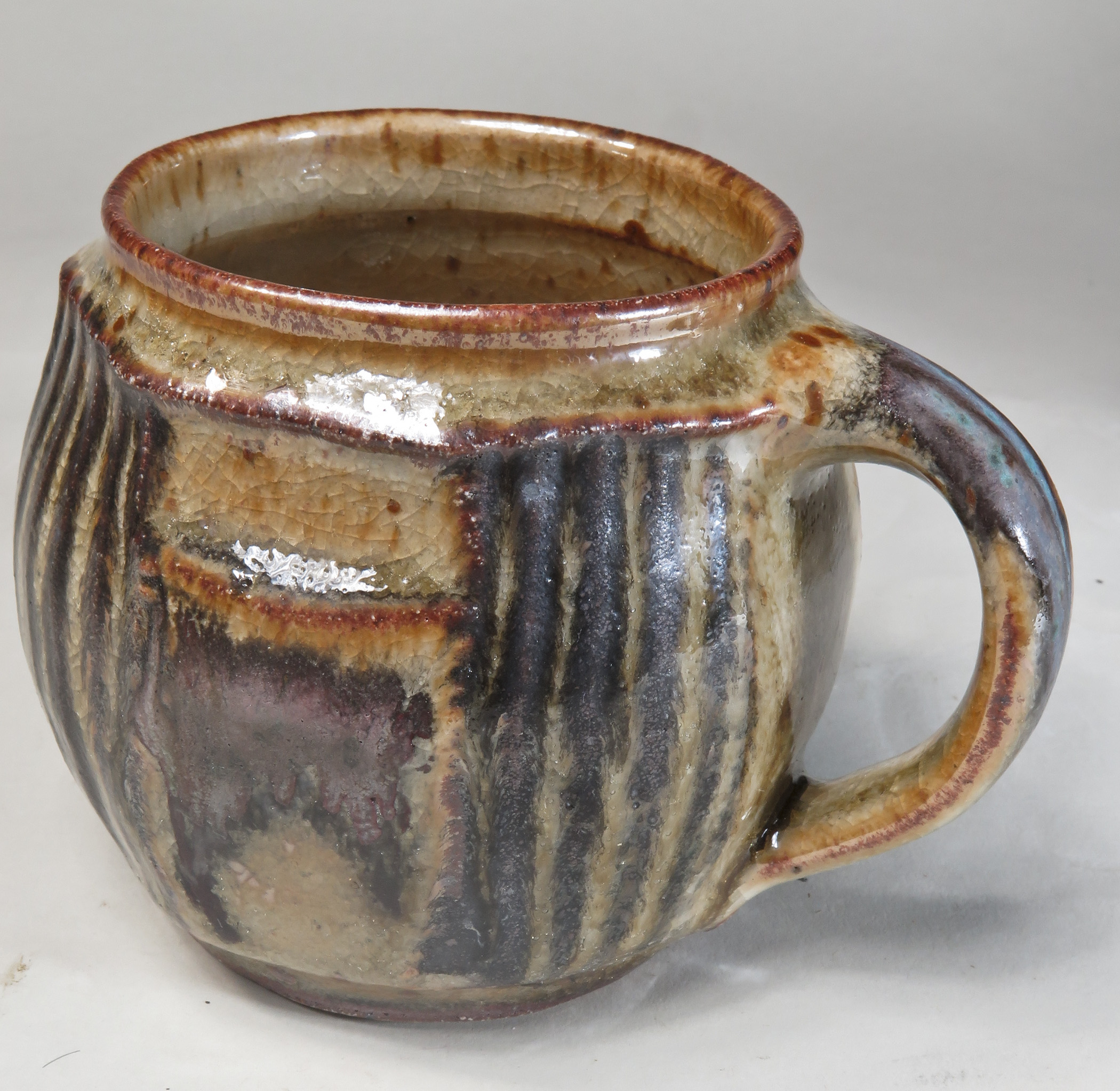 https://lukemetzceramics.com/wp-content/gallery/2017-may-mugs/LM_5904_Mug.jpg